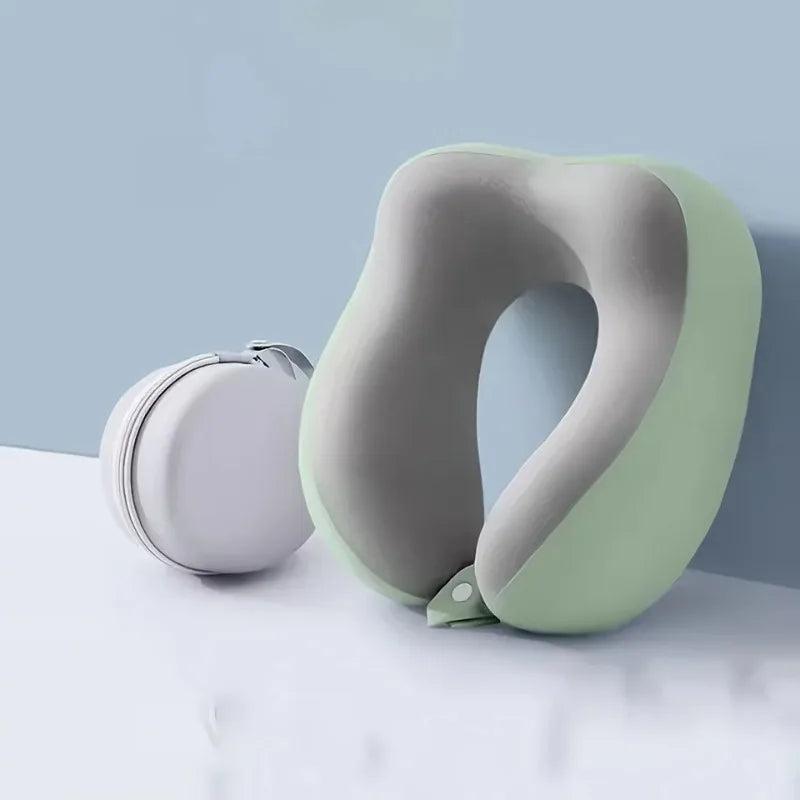 Comfortable U-shaped neck pillow with storage bag – ideal for travel, napping, and office use